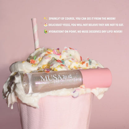 Lip Oil with Cotton Candy Scent. Clear color with holographic glitter. Perfect for Glitter Makeup.